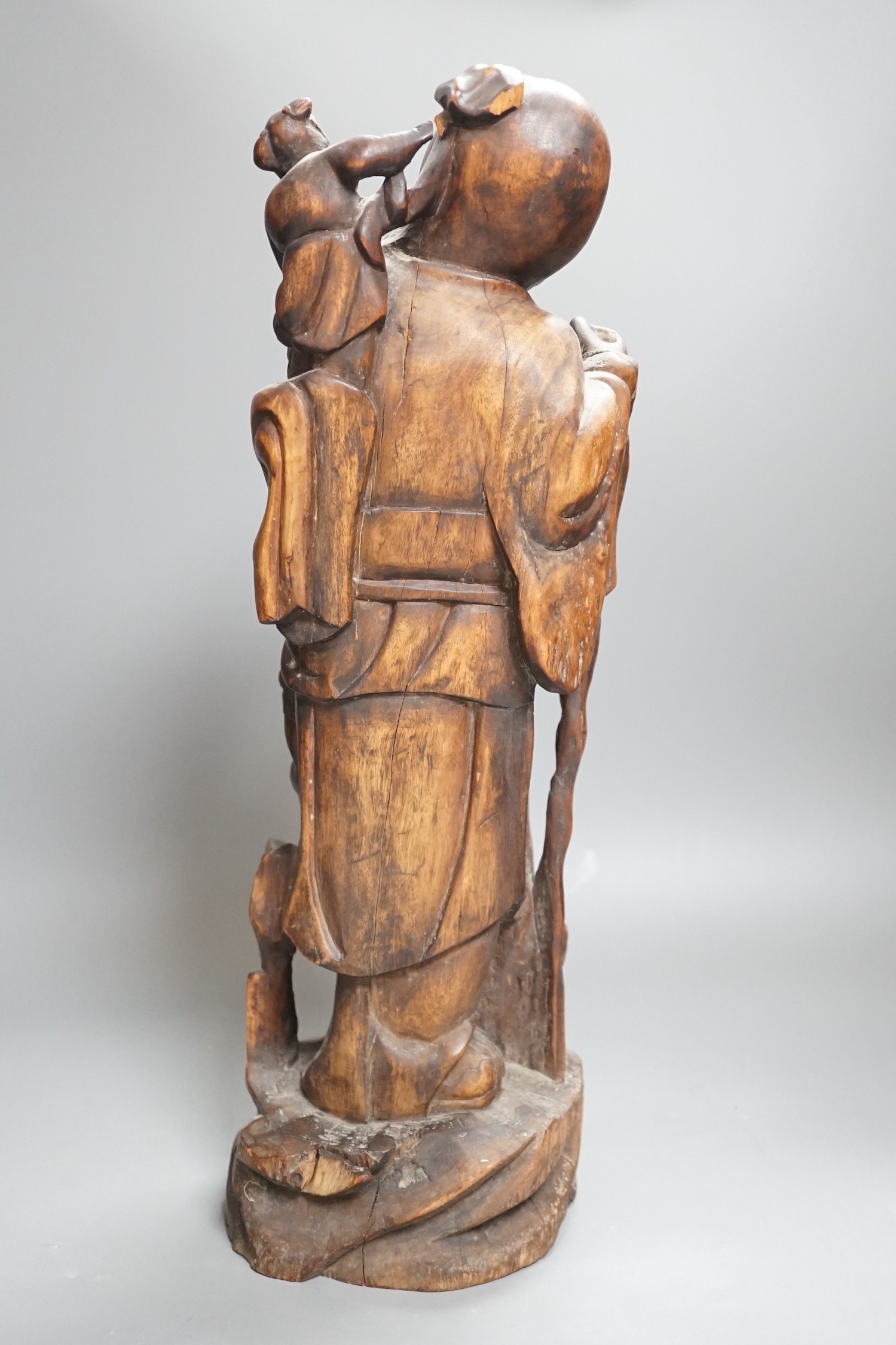 A large early 20th century Chinese hongmu Shou Lao group, 46.5cms high